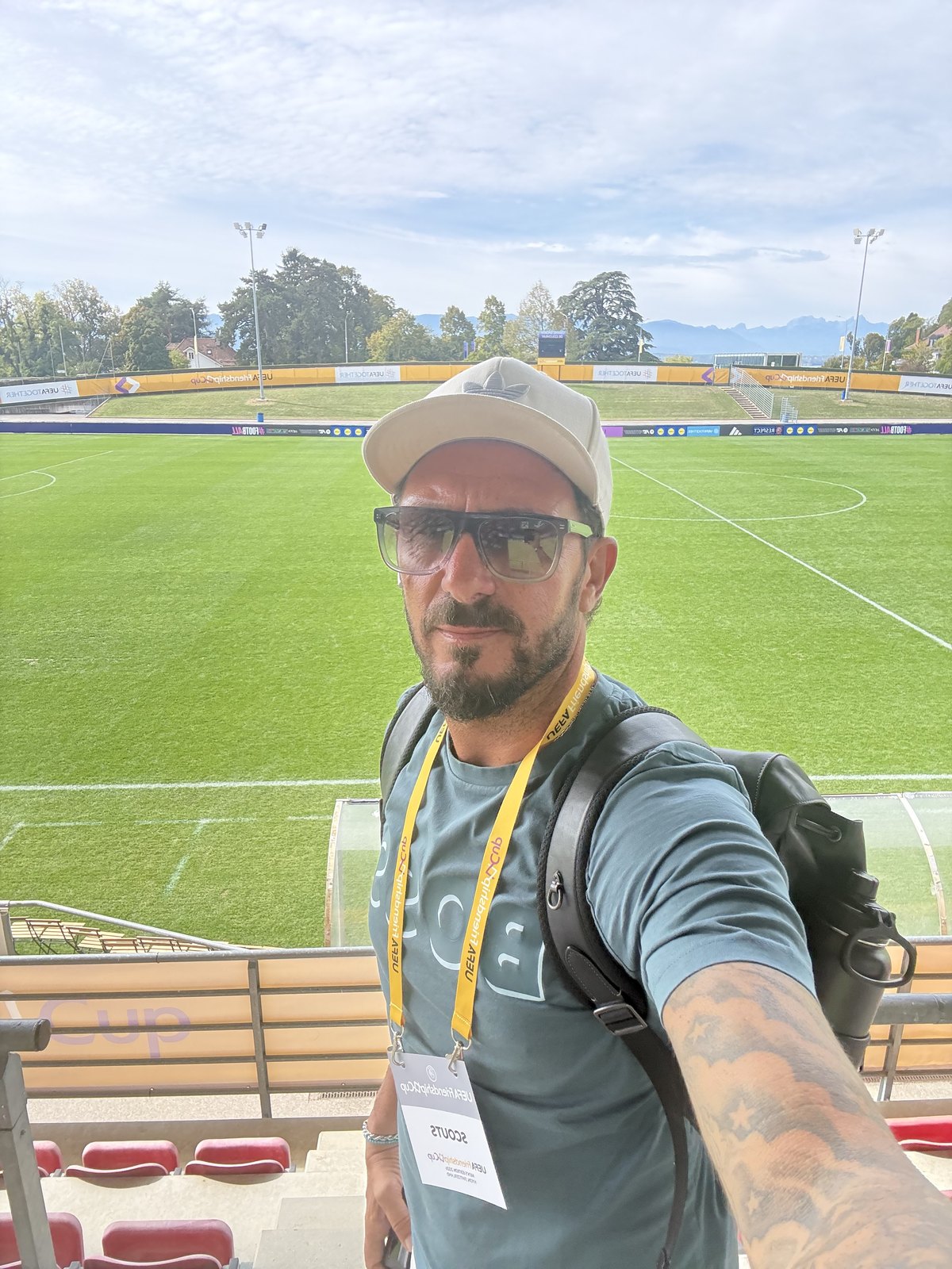 Asterios Themelis in the stands with his scout accreditation at the UEFA Friendship Cup