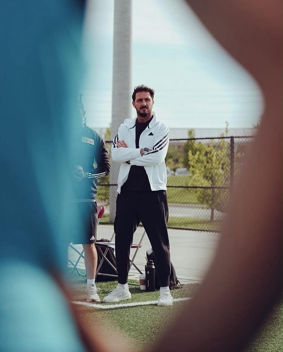 Asterios Themelis watching from the touchline